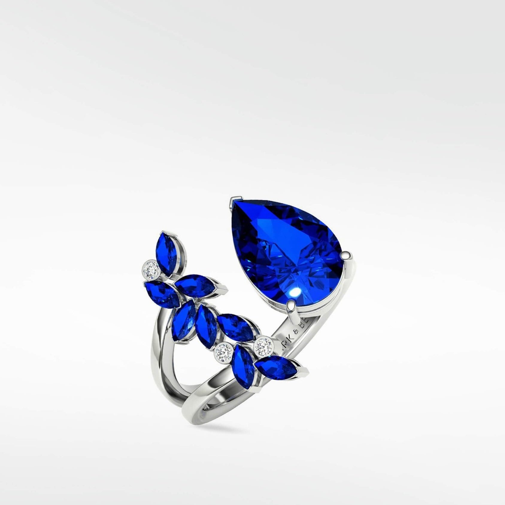 Veto Blue Sapphire Open Petal Cocktail Ring in 18K White Gold - Lark and Berry