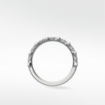 Side profile of the Abelia Diamond Ring, a contemporary white gold eternity band set with a continuous row of diamonds.