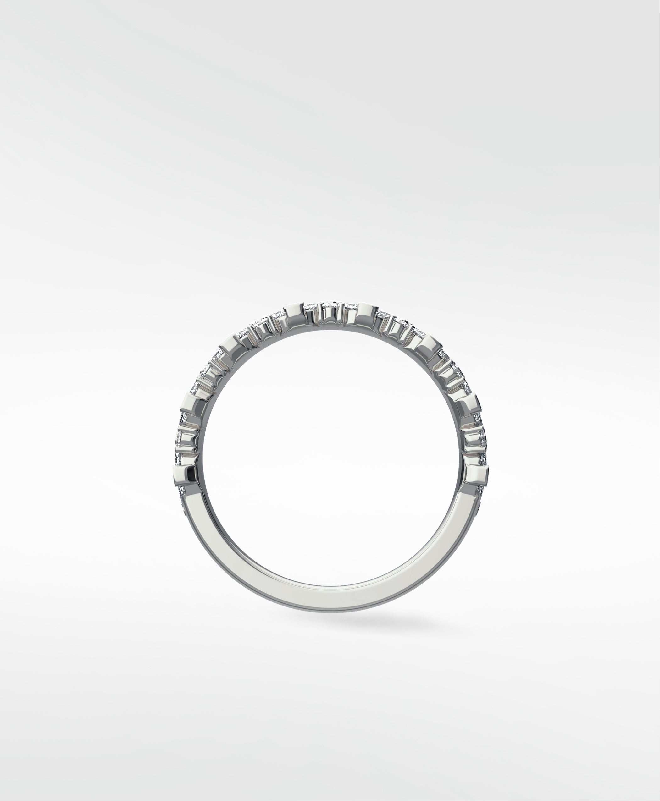 Side profile of the Abelia Diamond Ring, a contemporary white gold eternity band set with a continuous row of diamonds.