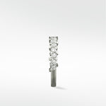 Side view of the Lark & Berry Abelia Diamond Ring, showing its contemporary band with marquise and round diamonds.