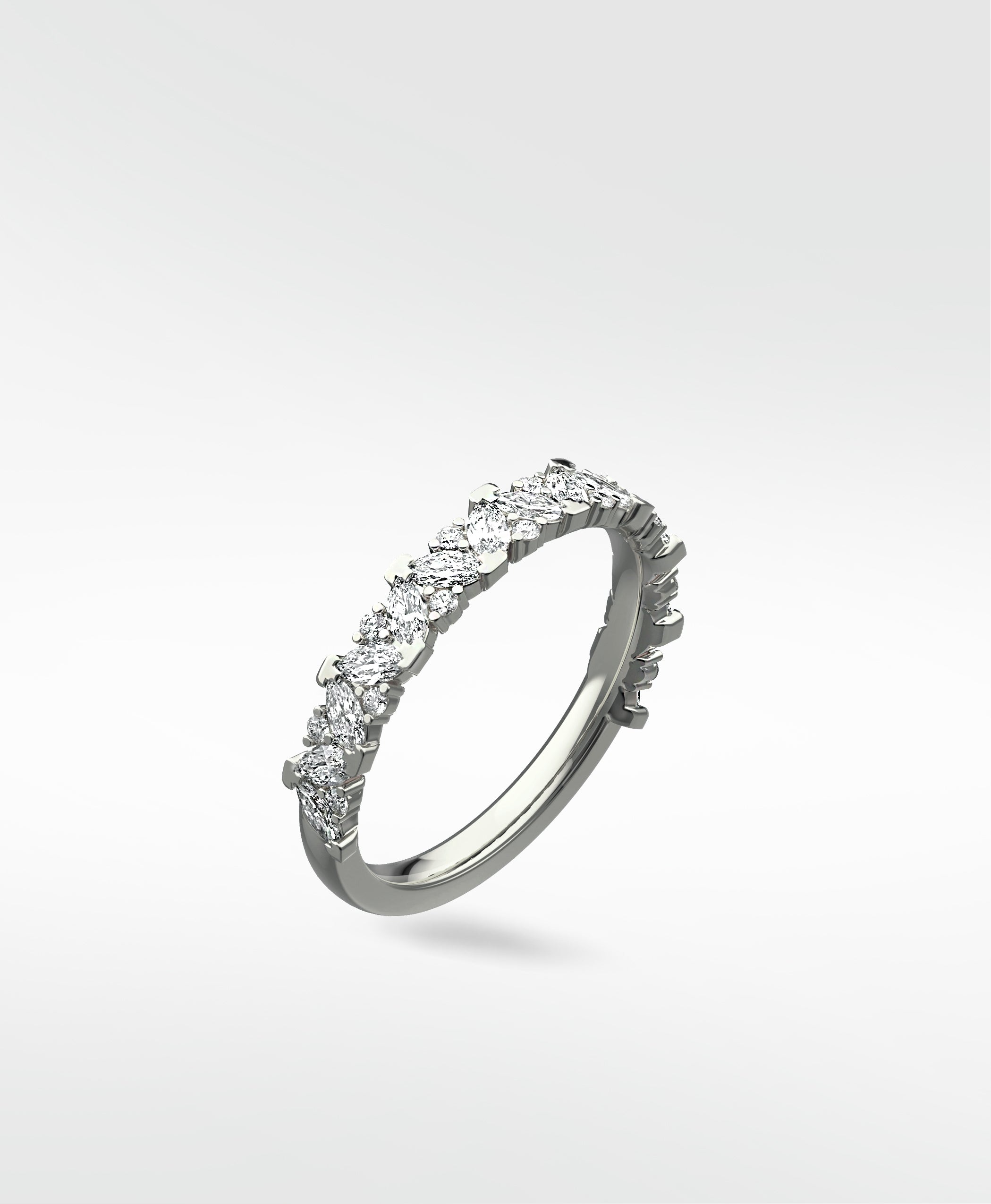 Lark & Berry's Abelia contemporary eternity ring in white gold with scattered marquise and round diamonds.