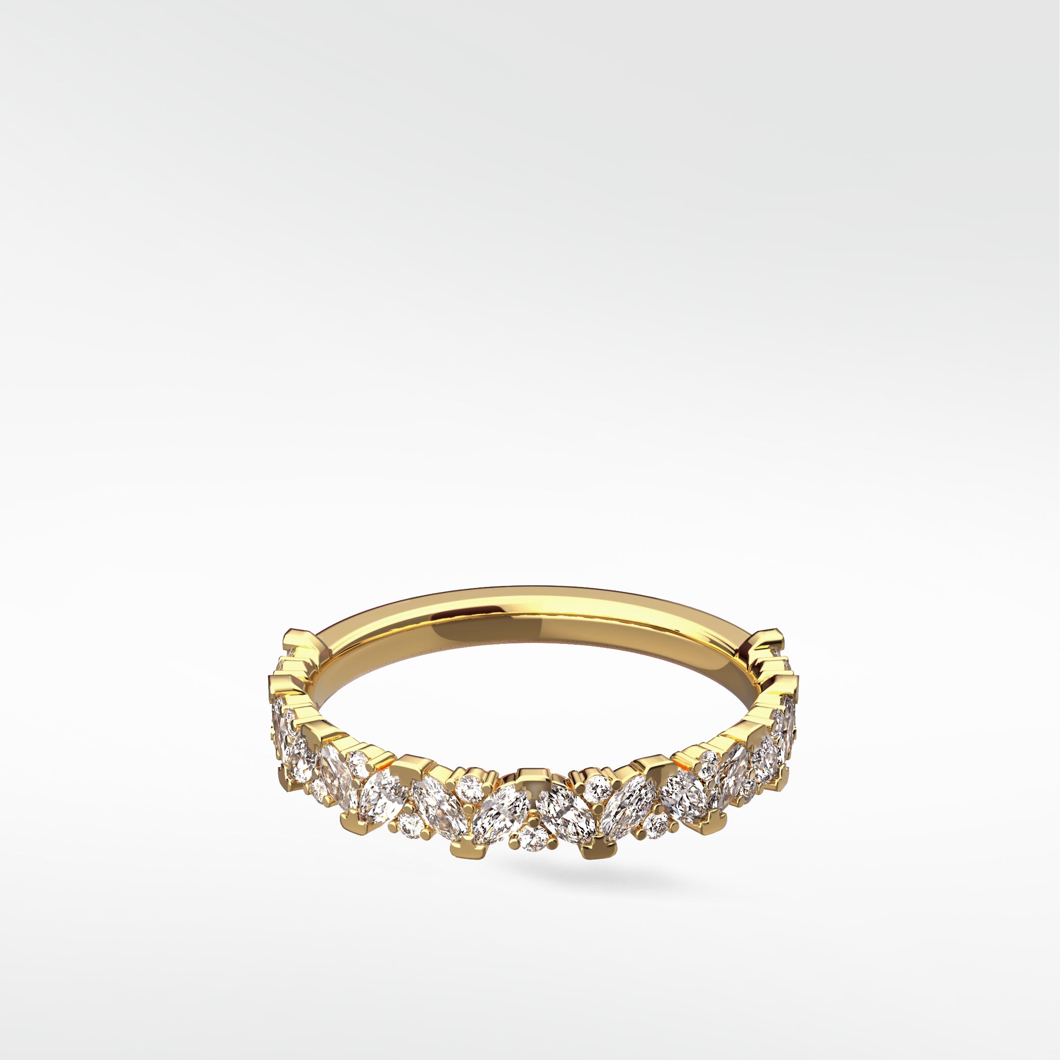 The Abelia Diamond Ring in yellow gold, featuring a contemporary eternity band with marquise and round diamonds.