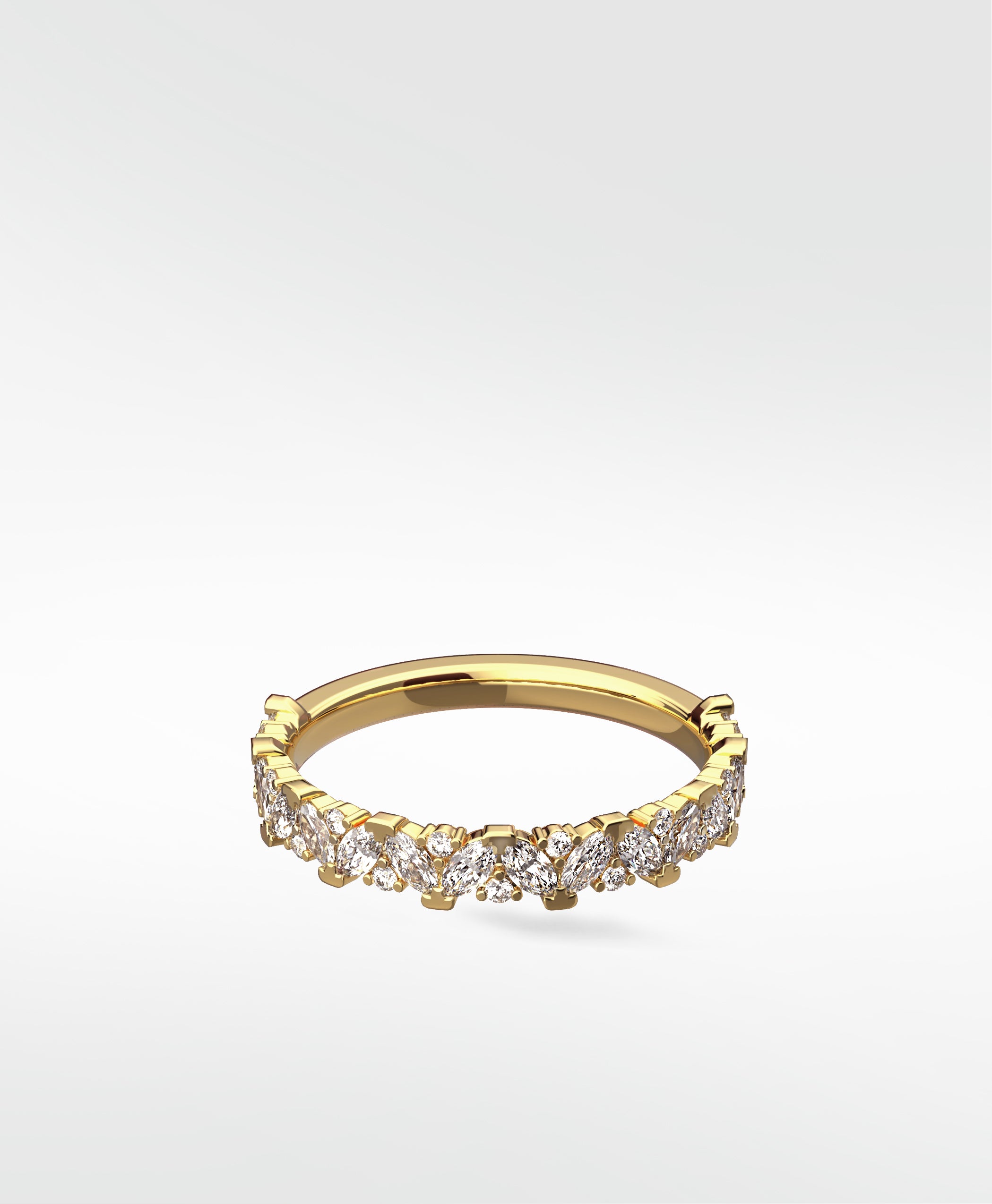 The Abelia Diamond Ring in yellow gold, featuring a contemporary eternity band with marquise and round diamonds.
