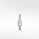 Front view of the Lark & Berry Modernist Oval Diamond Hoop earring featuring a pavé diamond band set in white gold.