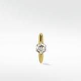 A single 14k yellow gold knife-edged hoop earring featuring a bezel-set hexagonal diamond, shown on a white background.
