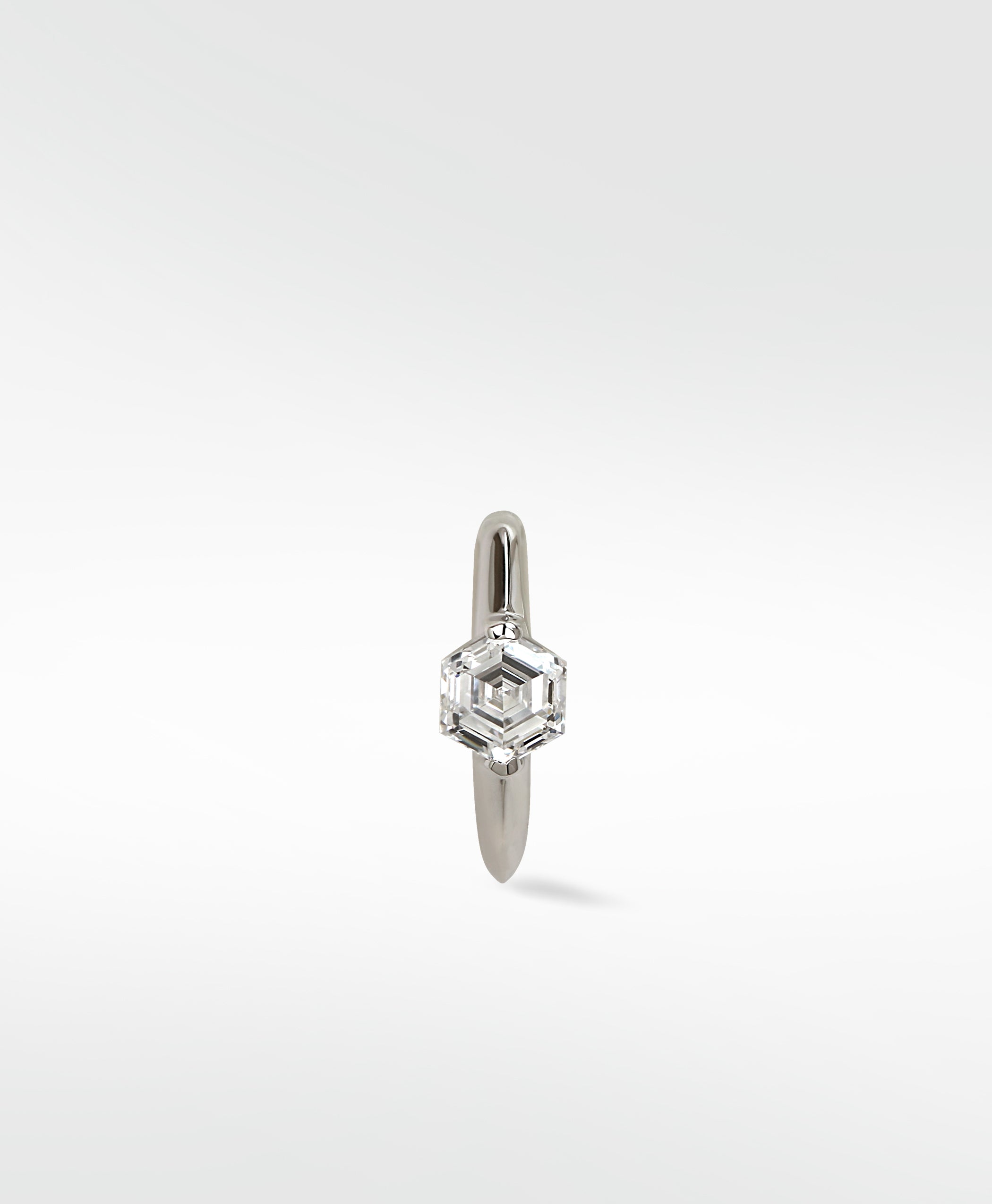 Front view of the Modernist Hexagonal Diamond Knife Edged Hoop in 14k white gold, showcasing the unique hexagonal diamond.