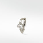 Lark & Berry Modernist hoop earring in 14k white gold with a hexagonal diamond on a knife-edged band.