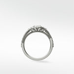 Side profile of the Torreya Diamond Engagement Ring in platinum, showing its pavé split shank and intricate diamond floral gallery.